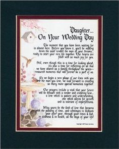 a framed poem with flowers and birds on it that says daughter on your wedding day