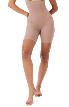 This sculpting shaper is lightweight and powerful with booty-lifting zones, a seamless design and high waist for supportive coverage. Support level: Shape-a firm hug Lined double gusset 55% nylon, 45% elastane Machine wash, dry flat Imported Compressive Beige Shapewear With Built-in Shorts, Compressive Short Beige Shapewear, Compressive Beige Short Shapewear, Beige Compressive Shapewear Shorts, Compressive Beige Shapewear Mid-thigh Length, Beige Compressive Mid-thigh Length Shapewear, Beige Compression Shapewear Shorts, High Stretch Beige Shapewear With Built-in Shorts, Beige Compression Shapewear With Short Leg