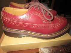 Doc Marten, red, wing tips, oxfords, shoes, made in England. UK 7, US mens 8, US ladies 9. New, no wear. Please note measurements carefully! Please read all measurements and view all photos provided before purchasing as I do NOT accept returns. I do my best to list accurate measurements and notate all visible flaws/signs of wear. I am happy to send additional pictures of any listing. I usually ship the next business day after an order is placed. I am not responsible for lost or damaged packages Red Goodyear Welted Lace-up Oxfords, Burgundy Wingtip Oxfords With Rubber Sole, Brown Wingtip Oxfords With Red Sole, Red Goodyear Welted Wingtip Oxfords, Red Brogue Oxfords For Derby, Retro Wingtip Oxfords With Goodyear Welt, Retro Wingtip Goodyear Welted Oxfords, Retro Goodyear Welted Wingtip Oxfords, Brogues Shoes