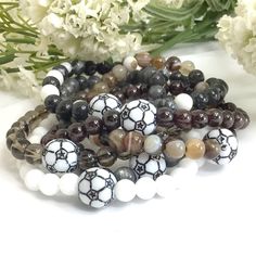 "✦Handmade item ✦Material: gemstone and plastic soccer bead ✦Shape: Round ✦Bead size: 6mm ✦Bracelet length: 7.5\" ( Fit with 6.75\" wrist size) ✦QTY: 1 pcs / package ✦✦Please measure your wrist size, then order the bracelet. MEASURE YOUR WRIST:    - Measure around at the wrist bone in tape or even a strip of paper.   - Choose a place where you would normally wear a bracelet.  Make it as loose or snug.   - To use the strip of paper, mark where the end of the bracelet needs to be and then measure the paper with a ruler.   - Increase the wrist measurement in the following increments to determine the bracelet size for how you want the bracelet to fit.      Add about 1/4 to 1/2 inch for a loose fit. Show your support for your child/friend at their next game! These bracelets make wonderful gifts Stocking Stuffers For Girls, Mom Bracelet, Sports Bracelet, Moms Bracelet, Gifts Fo, Perfect Stocking Stuffers, Soccer Mom, Stretchy Bracelets, Color Calibration