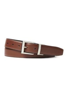 This sleek leather belt from Polo Ralph Lauren reverses from black to brown to easily coordinate with any dressy look. This refined style is finished with a gleaming metal buckle and keeper. 1" wide Single-prong metal buckle Single metal keeper Tapered square tip Signature Pony engraved at the buckle | Polo Ralph Lauren Men's Reversible Leather Dress Belt, 34 Sleek Leather Belt Buckles For Formal Wear, Modern Brown Belts For Office Wear, Elegant Brown Belt For Business Casual, Elegant Brown Belt Buckles For Formal Wear, Elegant Brown Belt For Formal Occasions, Elegant Brown Formal Belt, Elegant Brown Belt Buckles For Business, Elegant Brown Belt Buckle For Workwear, Modern Fitted Belts For Formal Occasions