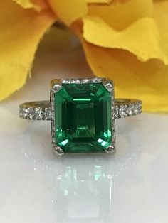 Emerald Cut Emerald And Diamond Engagement Wedding Anniversary Ring In 14K White Gold #5364 by InfinityJewelersUSA on Etsy 14k White Gold Emerald Cut Halo Ring, Radiant Cut Emerald Ring With Halo Setting For Promise, Emerald Cut Gemstone Halo Ring In White Gold, Formal Diamond Halo Ring For May Birthstone, Formal Halo Diamond Ring With May Birthstone, Gia Certified Radiant Cut Ring For May Birthstone, Asscher Cut Emerald Ring With Halo Setting For Promise, Classic Emerald Ring With Asscher Cut Halo, Classic Green Halo Ring With Diamond Accents