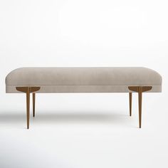 an upholstered bench with two oval legs and a beige cushion on the back