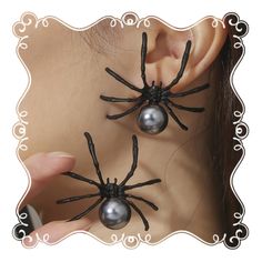 PRICES MAY VARY. Mysterious Spider Design: Our earrings showcase meticulously crafted spider motifs, symbolizing the enigmatic world and the allure of gothic aesthetics. Captivating Black Pearls: The black pearls elegantly enhance the beauty of the spiders, creating a mesmerizing and mysterious allure reminiscent of the night. Dark Gothic Aesthetic: The gothic-inspired design adds a touch of elegance and mystique, making these earrings perfect for those who embrace the dark and mythical allure. Dark Gothic Aesthetic, Spider Design, Red Heart Earrings, Spider Earrings, Black Pearls, Gothic Earrings, Earrings Halloween, Pearl Dangle Earrings, Gothic Aesthetic