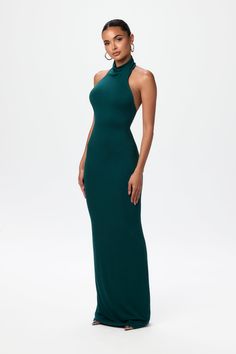 Elevate your look in our bodycon maxi dress. Designed with a halter neckline, open upper-back and a body hugging finish. Style with heels or flats for day or night plans. NW Collection Import 95% Viscose, 5% Spandex Model wears size X-Small True to size Double-lined Teal Outfit, Black Halter Maxi Dress, Maxi Halter Dress, Bodycon Maxi Dress, Naked Wardrobe, Halter Maxi Dress, Bodycon Maxi Dresses, Halter Maxi, Halter Maxi Dresses