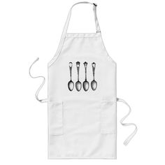 three spoons and two forks on a white apron