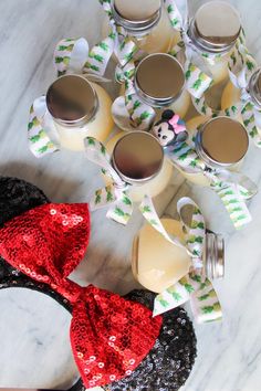 minnie mouse ears and cups on a table