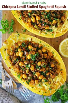 two spaghetti dishes with chickpea lentils and spinach sprinkled on top