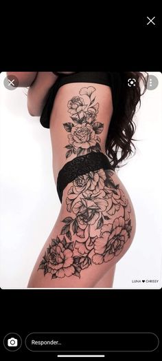 a woman's thigh with flowers on it