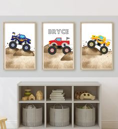 two pictures of trucks are hanging on the wall next to a book shelf with toys