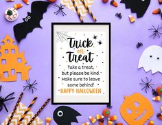 a frame with the words trick or treat on it surrounded by halloween decorations and paper bats