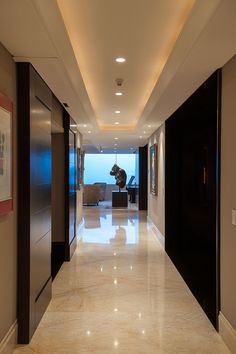 the hallway is clean and ready for us to use as an entrance way in this modern home