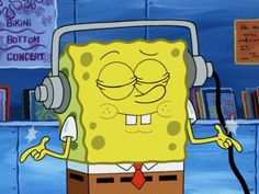 the spongebob is listening to music on his headphones