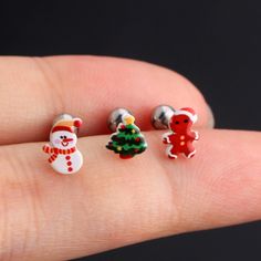 One package includes three pieces cartilage earrings. GAUGE: 16G (1.2mm) ; Bar Length: 6mm. MATERIAL: 316L Stainless Steel Christmas season, you will love these 3pcs 16 gauge tragus studs set.The first features a cute snowman. The second features a Christmas tree earrings.The last one features Gingerbread man. All of them are super cute holiday choices for yourself or your love ones. These helix earring offer different styles and sufficient quantities for you to match with different clothes and Nickel Free White Piercings As Gift, Nickel-free White Piercings As A Gift, Nickel-free White Piercings As Gift, Nickel-free White Cartilage Earrings As Gift, Tragus Piercing Jewelry, Earring Minimalist, Piercing Tragus, Tragus Stud, Minimalist Earring