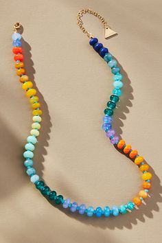 What Makes It Great: This *only-at-Anthro* stunner features a mix of glass and semi-precious beads, each hand-picked with care to create a vibrant motif. Rainbow Donut, Monogram Pendant Necklace, Rainbow Stone, Vacation Outfits Women, Diamond Chain Necklace, Resort Wear For Women, Yellow Jewelry, Rainbow Necklace, Semi Precious Beads