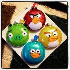 three christmas ornaments with angry birds on them