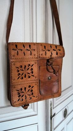 "This is really special crossbody bag, tooled leather crossbody With adjustable Strap, some signs of use like can see at pics but in general in good condition! Perfect for your next adventure!! Unisex Measures: 10.23\" x 10.23\" (26 cm x 26 cm) DeeP: 2.75\" (7 cm) Strap: 46.06\" (117 cm) Thanks for stopping by!!" Hand Tooled Crossbody Satchel For Travel, Vintage Brown Hand-tooled Travel Shoulder Bag, Hand Tooled Vintage Brown Travel Shoulder Bag, Leather Phone Case Handmade, Leather Patterns, Vintage Leather Bag, Leather Pattern, Leather Phone Case, Tooled Leather