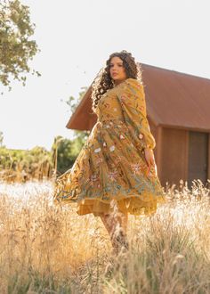 Yellow Long Sleeve Embroidered Dress For Spring, Yellow Long Sleeve Embroidered Spring Dress, Flowy Gold Dress For Spring, Gold Flowy Dress For Spring, Gold Floral Embroidery Dress For Spring, Yellow Bohemian Dress For Fall, Yellow Bohemian Fall Dress, Marigold Dress, Voluminous Skirt