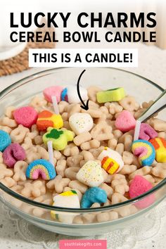 Check out these realistic Lucky Charms cereal-inspired candles! They are perfect for unique home decor, an event you're planning or even for a birthday party. Lucky Charms cereal candle features even more charms, including the iconic magic gems and rainbow, as well as a subtle vanilla scent that will transport you back to the breakfast table in seconds. If you love food inspired candles add this to your collection! These Lucky Charms candles are scented with vanilla. Awesome candle decor!