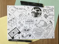 a notebook with some drawings on it