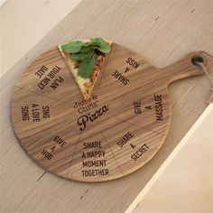 a wooden pizza board with the names of different types of pizza on it and a slice of pizza sitting on top of it