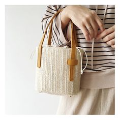 Minimalistic women's handbag. Perfect for summer! Material: Straw + PU Leather Size: 18cm long x 17cm tall (7in x 7in) Designer Style ID: 8173 Leather and Straw Bucket Bag, Summer Handbag, ins Style Purse Rectangular Phone Bag For Summer Vacation, Beige Bucket Bag With Single Handle, Summer Rectangular Box Bag With Adjustable Strap, Trendy Rectangular Phone Bag For Beach, Trendy Beige Bucket Bag With Single Handle, Trendy Rectangular Beach Phone Bag, Summer Beach Rectangular Phone Bag, Beige Single Handle Bucket Bag, White Bucket Bag With Mobile Phone Holder