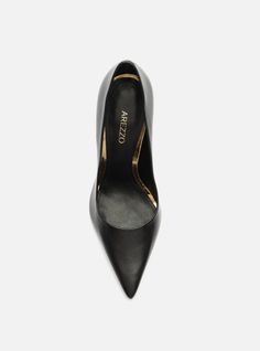 Black pump. The style features a high stiletto heel and a pointed toe. It is closed with a rounded cutout on the upper over the instep, and a snug fit on the sides. With an insole in the same color as the sandal and the brand name engraved, it shows the instep. Why follow this trend? The iconic Emily High Stiletto Pump lengthens the leg and boosts your confidence with each powerful stride. The ultra-luxe leather and the pointed toe exude effortless sophistication. Get ready to fall in love with Golden Heels, Luxe Style, Stiletto Pumps, Black Pumps, Leather Pumps, Leather Slip Ons, Stiletto Heel, Snug Fit, Fall In Love