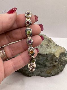 "Sterling Silver Gemstone Link Bracelet Amethyst Citrine Peridot Garnet 7.5\" 18.6g. Marked 925. Condition is very good, scuffs and scratches on the surface from wear. Thank you for looking! Prices on shop items are fair and reasonable, so all prices are firm. No reserves, all items sold as-is. Please review photos and description carefully before purchasing. Please let me know of you have any questions or special shipping requests such as postal insurance. Once an item is shipped and tracking i Amethyst Multi-stone Bracelet Gift, Multi-stone Amethyst Bracelet, Chain Link Bracelet, Gold And Silver, Link Bracelets, Pandora Charm Bracelet, Chain Link, Citrine, Garnet