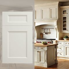 a kitchen with white cabinets and wooden floors