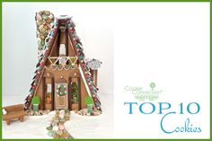 a gingerbread house is decorated with candy and candies for the top 10 cookies