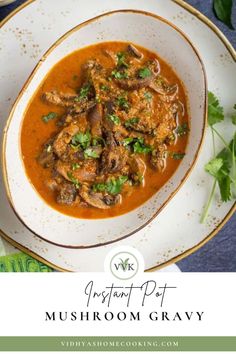 a white bowl filled with mushroom gravy and garnished with cilantro