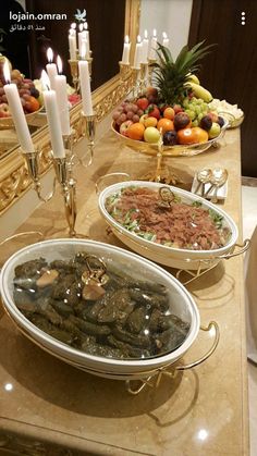 the buffet table has many different types of food on it