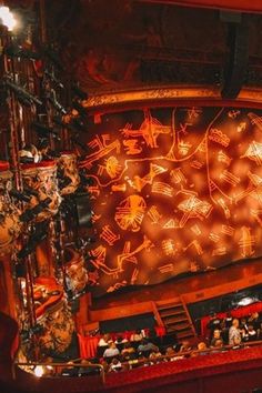 an overhead view of a theatre with people sitting on the stage