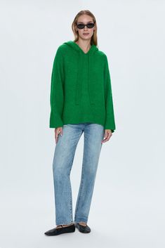 Relaxed fit hooded pullover sweater with an oversized silhouette. Crafted from a soft to the touch wool knit blend. Raglan shoulders with relaxed sleeves and curved hem. Tonal drawstring at neckline. Fern is a vibrant shade of green. 64% Acrylic / 13% Polyester / 8% Alpaca / 9% Nylon / 4% Wool / 2% Spandex Imported Cashmere Hooded Sweater With Drawstring, Fall Cashmere Sweater With Drawstring Hood, Cashmere Sweater With Drawstring Hood For Fall, Long Sleeve Cashmere Hoodie, Knit Hoodie Sweater With Drawstring Hood, Knit Hoodie With Drawstring, Knit Sweater With Drawstring Hood, Cashmere Sweater With Drawstring Hood, Long Sleeve, Cashmere Long Sleeve Sweater With Drawstring Hood