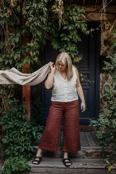 "Japanese style loose 3/4 linen pants TOKYO. With an elastic waist band and pockets. Perfect for every occasion - you can wear it to work, a picnic or even a night out! Details This listing is for 1 TOKYO linen pants Rugilė is 175 cm/5'8\" tall and wearing terracotta TOKYO pants in size XL and Ugnė is 175 cm/5'8\" tall and wearing charcoal in size S. Available in XS, S, M, L, XL, XXL Made from 100% certified European linen Stone washed for maximum softness Available in 9 colors Please note that Linen Wide-leg Capris With Pockets, Wide-leg Linen Capris With Pockets, Wide Leg Flax Pants For Summer, Linen Capris With Pockets, Summer Linen Wide-leg Capris, Summer Wide-leg Linen Capris, Wide Leg Linen Capris For Summer, Style Linen Pants, Linen Pants For Women