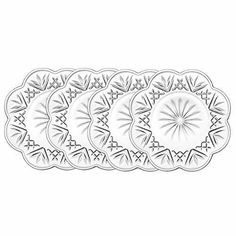 four white decorative plates on a white background