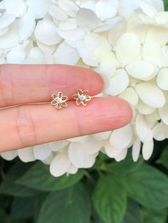 925 Sterling Silver Cz Flower Stud Earrings - Metal: 925 Sterling Silver (Finish: Gold Plated) - Stone: Clear Cubic Zirconia, Round, Prong - Shape: Open Flower - Dimension: 6.5mm(0.26 in), Thickness 0.8mm/1.8mm (Please note that the flower is VERY TINY.) - Closure: Post at near Center, Push Back - Color: Gold Tiny Sterling Silver Flower Earrings, Classic Flower-shaped Cubic Zirconia Earrings, Dainty Flower-shaped Cubic Zirconia Earrings, Flower-shaped Cubic Zirconia Cluster Earrings For Gifts, Cubic Zirconia Gemstone Flower-shaped Earrings, Open Flower, Flower Stud Earrings, Earrings Metal, Flower Stud