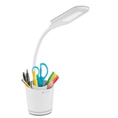 a white desk lamp with scissors, pens and pencils in it on a white background