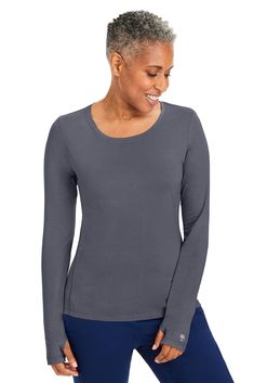 PRICES MAY VARY. MODERN FIT - The Long Sleeve Tee for women features a modern fit and stylized seams that offer a sleek, flattering look. This contemporary design is perfect for various settings, from casual to semi-formal, ensuring you stay stylish and comfortable. CONVENIENT THUMBHOLES - Women's scrub tee thumbholes are incorporated into the design of the T-shirt to enhance comfort and functionality. These thumbholes keep the sleeves in place, providing additional warmth and preventing them fr Scrubs For Women, Length Measurement, Safety Clothing, Healing Hands, Athletic Looks, Womens Scrubs, Stretchy Tops, Tees For Women, Knit Tees