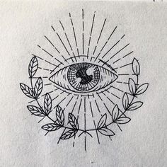 a drawing of an eye with leaves around it