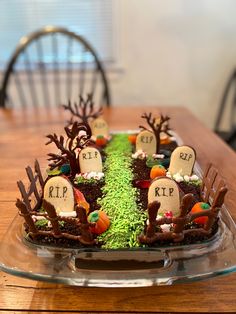 a cake decorated to look like a graveyard