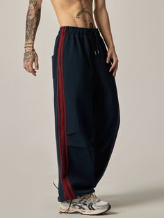 WN6208
■size(cm)





Length


Hip




S


100


112




M


102


116




L


104


120




XL


106


124




 
■model
174cm 61kg L
■material
cotton 65% polyester 35% Trendy Blue Sweatpants For Sports, Casual Wide Leg Bottoms With Vertical Stripes, Casual Wide Leg Bottoms With Striped Hem, Casual Streetwear Bottoms With Signature Stripes, Casual Wide Leg Pants With Contrast Stripes, Casual Bottoms With Signature Stripes For Streetwear, Casual Wide-leg Pants With Vertical Stripes, Casual Wide-leg Vertical Stripes Pants, Sporty Striped Pants For Loungewear