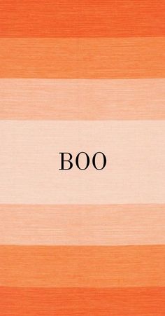 an orange and white striped wallpaper with the word boo written in black on it