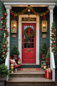 a red front door decorated with christmas decorations