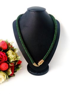 "Handmade crocheted beaded snake necklace made from Czech beads. Necklace of green and yellow-green golden snake beads. Jewelry Green Snake. Lightning in the form of the head and tail of a snake. Crocheted necklace. It will be a great gift. Necklace will emphasize your individuality, originality and uniqueness. Necklace length 50 cm (20 \"), thickness 0.7 cm. If you have any questions, please contact me. Please contact me for a different size or color. I will complete your order within 7 days. T Handmade Snake Shape Necklace For Gift, Green Snake Necklace, Luxury Snake-shaped Necklace For Formal Occasions, Handmade Gold Snake-shaped Necklace, Handmade Snake-shaped Beaded Necklace For Gift, Beaded Snake, Snake Choker, Brass Snake-shaped Necklace For Gifts, Golden Snake