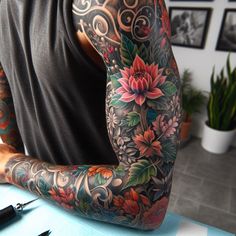 Various flowers like roses, lilies, and cherry blossoms intertwined Floral Tattoo Sleeve Men, Branch Sleeve Tattoo, Color Sleeve Tattoos For Men, Colorful Arm Tattoos, Cherry Blossom Sleeve Tattoo, Masculine Flower Tattoo, Full Color Sleeve, Men Sleeve Tattoos, Cherry Blossom Tattoo Men