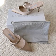 Brand New, Never Worn, Includes Box And Both Dust Bags, Manolo Blahnik “Campari” Beige/Nude Satin Maryjane Mule Pumps. Gorgeous Champagne, Nude, Beige Color Satin, With Crystal Bead Detail On The Strap. Maryjane, Closed Toe Mule Features A 70mm (2.75”) Heel Height, Slip On Style. Perfect “Quite Luxury” Style. Originally Purchased Them For $945 (Plus Taxes And Fees). They Are A Size Eu 38 (Equivalent To A Us 8). Pristine Condition. Chic Silk Heels For Wedding, Elegant Silk Heels For Cocktail Events, Elegant Silk Heels For Cocktail, Elegant Silk Heels Fitted, Fitted Silk Elegant Heels, Elegant Fitted Silk Heels, Elegant Beige Heels For Cocktail, Designer Champagne Heels, Luxury Beige Heels For Wedding