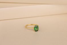 A popular choice in the jewelry world, emerald is the stone of May and has been associated with good luck since ancient times. This ring features an elegant oval cut green emerald set in sterling silver or 10K, 14K and 18k gold, making it a feminine and timeless piece that goes with any outfit. Details of the product Material: 10K and 14K, 18K Solid Gold, Silver Gemstone: Emerald Gemstone Gemstone Size: 7x9 mm Unique Gift For people whom you love; Mom, Girlfriend, Wife, Fiance, Best Friend; Dainty Gift Idea; Valentine's Day Gift, Birthday Gift, Anniversary Gift, Gift For Engagement or Wedding, Promise Gift, Christmas Gift, Black Friday Gift, Mother's Day Gift, International Women's Day Gift, Memorial Gift. By gifting this elegant product to the most special person in your life, you can mak Silver Oval Engagement Ring, Emerald Stone Ring, Emerald Stone Rings, Turquoise Gemstone Earrings, Engagement Ring Dainty, Emerald Set, Raw Stone Earring, May Birthstone Rings, Emerald Cut Diamond Engagement