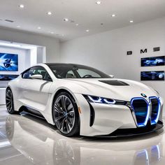 the bmw i8 concept car is displayed in a showroom with white walls and flooring