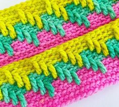 two crochet stitches are next to each other